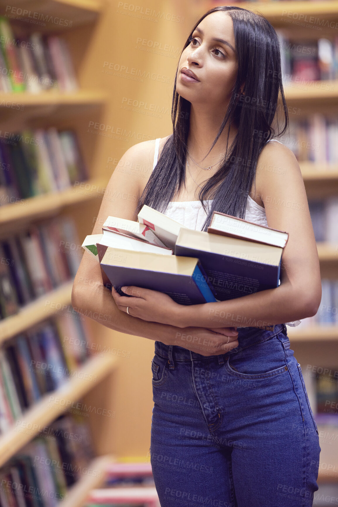 Buy stock photo Library, education or university and a woman student looking for books or study material in a bookstore. College, scholarship or literature with a young female on campus searching for a reading novel