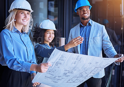 Buy stock photo Diversity, team and creative architect people working on a site plan with blueprint for construction or building. Business contractors in teamwork, planning and strategy with paper design layout.