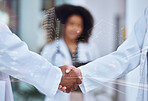 Handshake, future and collaboration of two doctors in labcoats shaking hands making deal in partnership. Trust and support for medical professionals greeting and meeting with city building reflection