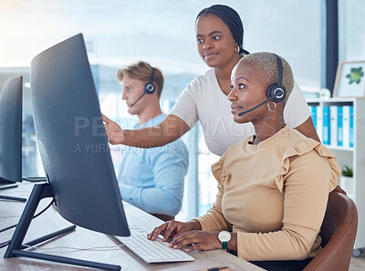 Buy stock photo Call center manager coaching sales consultant, telemarketing employee and crm customer service worker with computer software in office agency. Mentor training woman with pc tech solution and strategy