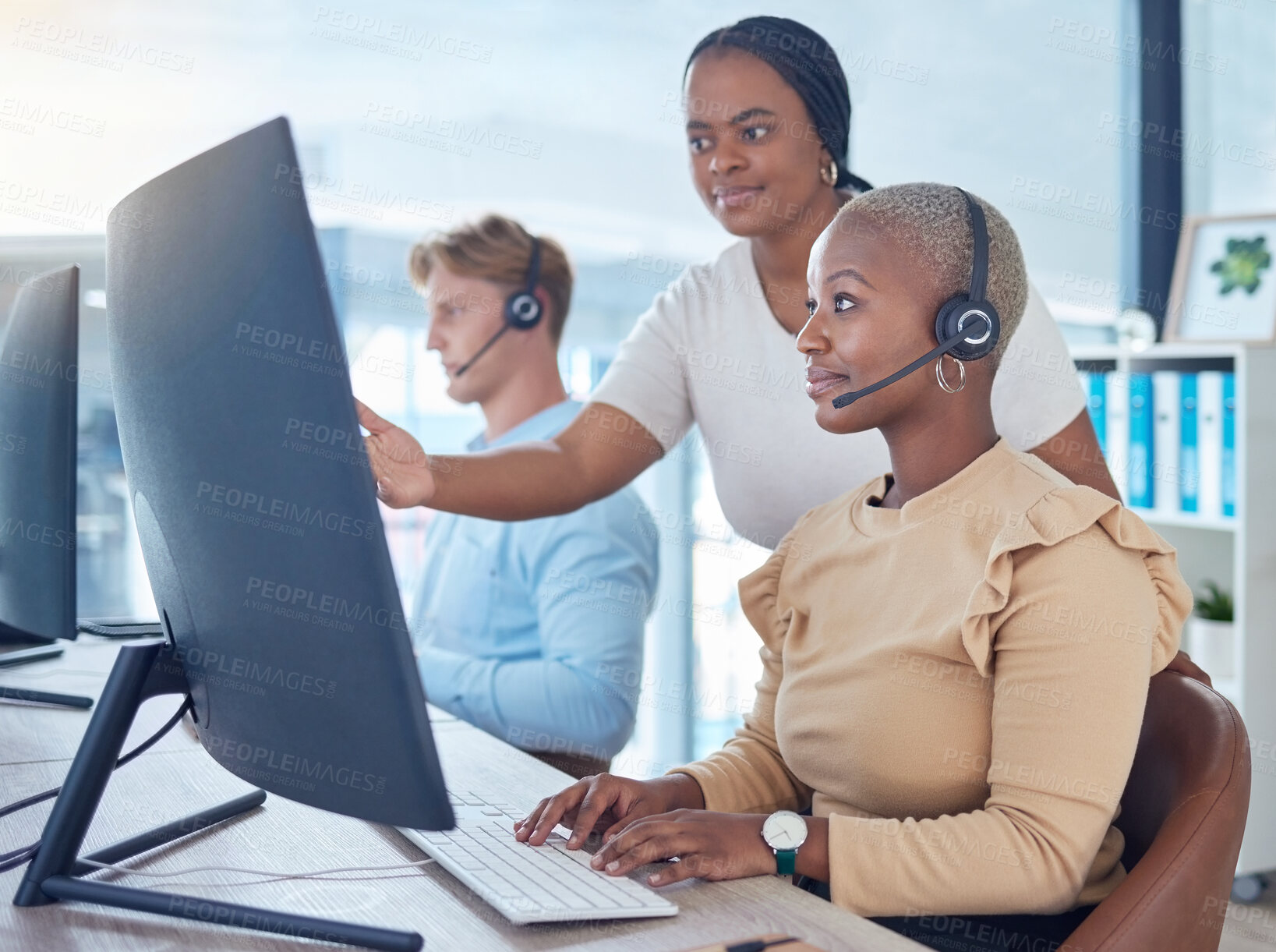 Buy stock photo Call center manager coaching sales consultant, telemarketing employee and crm customer service worker with computer software in office agency. Mentor training woman with pc tech solution and strategy