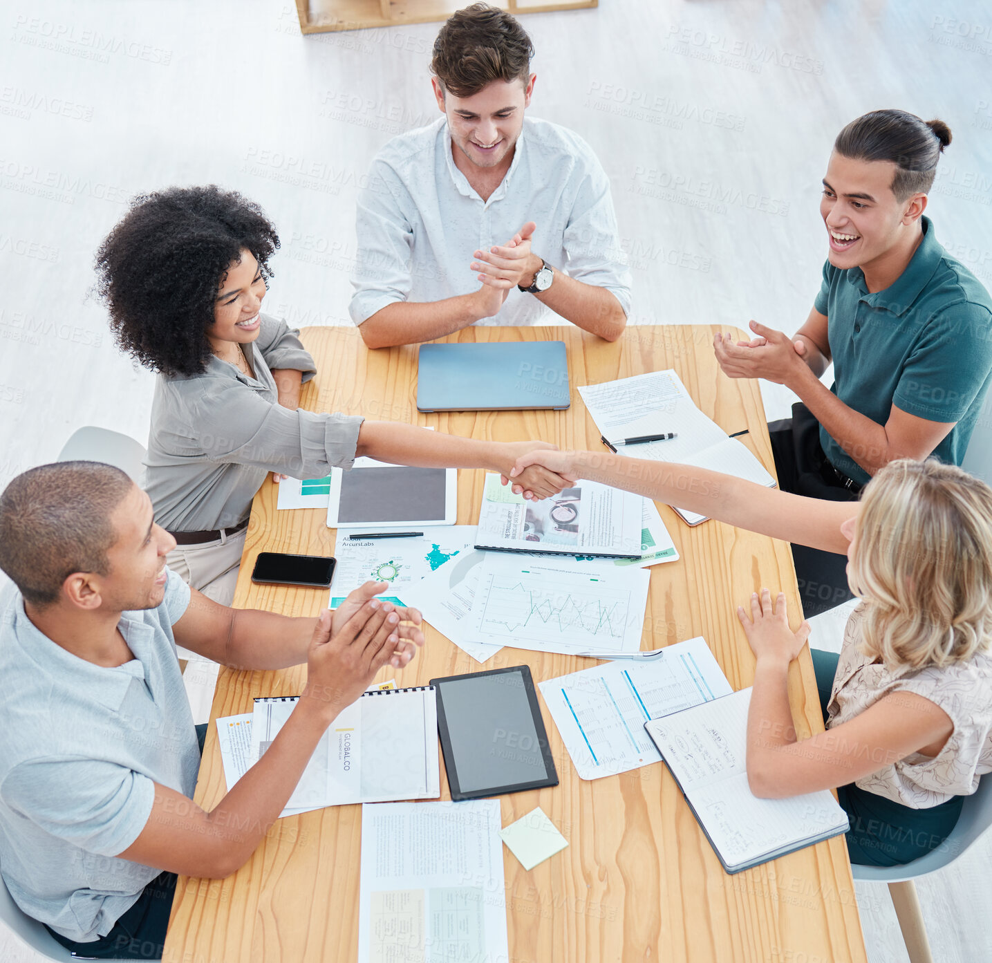 Buy stock photo Teamwork, handshake and applause with a team in collaboration and celebration of success in a meeting. Trust, support and wow in the planning of strategy, vision and mission for future growth