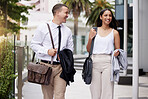 Business man and woman walk in city to work or company building. Corporate management team of happy and relax business people or employee travel in street while talking, smile and in a conversation