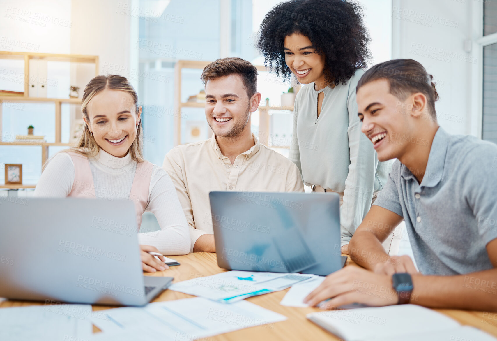 Buy stock photo Happy team collaboration and teamwork by business people watching a laptop and waiting for results or feedback. Diverse group online project with web developers trying new cad technology in an office