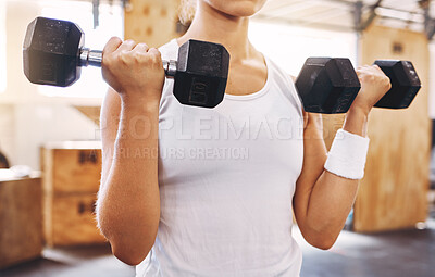 Buy stock photo Hands of woman, dumbbell and exercise or workout at the gym for fitness and health. Healthy, sport and sports trainer or athlete or gymnast training for muscle power and weight lifting competition 

