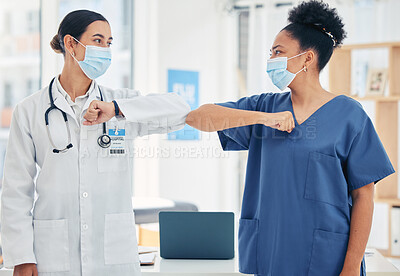 Buy stock photo Woman doctor and nurse, in a hospital elbow greeting, in surgical mask during the covid pandemic. Teamwork, healthcare worker and medical professional with protection from virus during consultation 