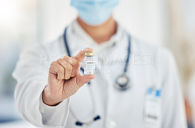 Buy stock photo Hand of medical doctor with covid vaccine bottle covid 19 virus pandemic medicine for health vaccination at clinic or hospital. Healthcare worker with corona medication or coronavirus treatment 