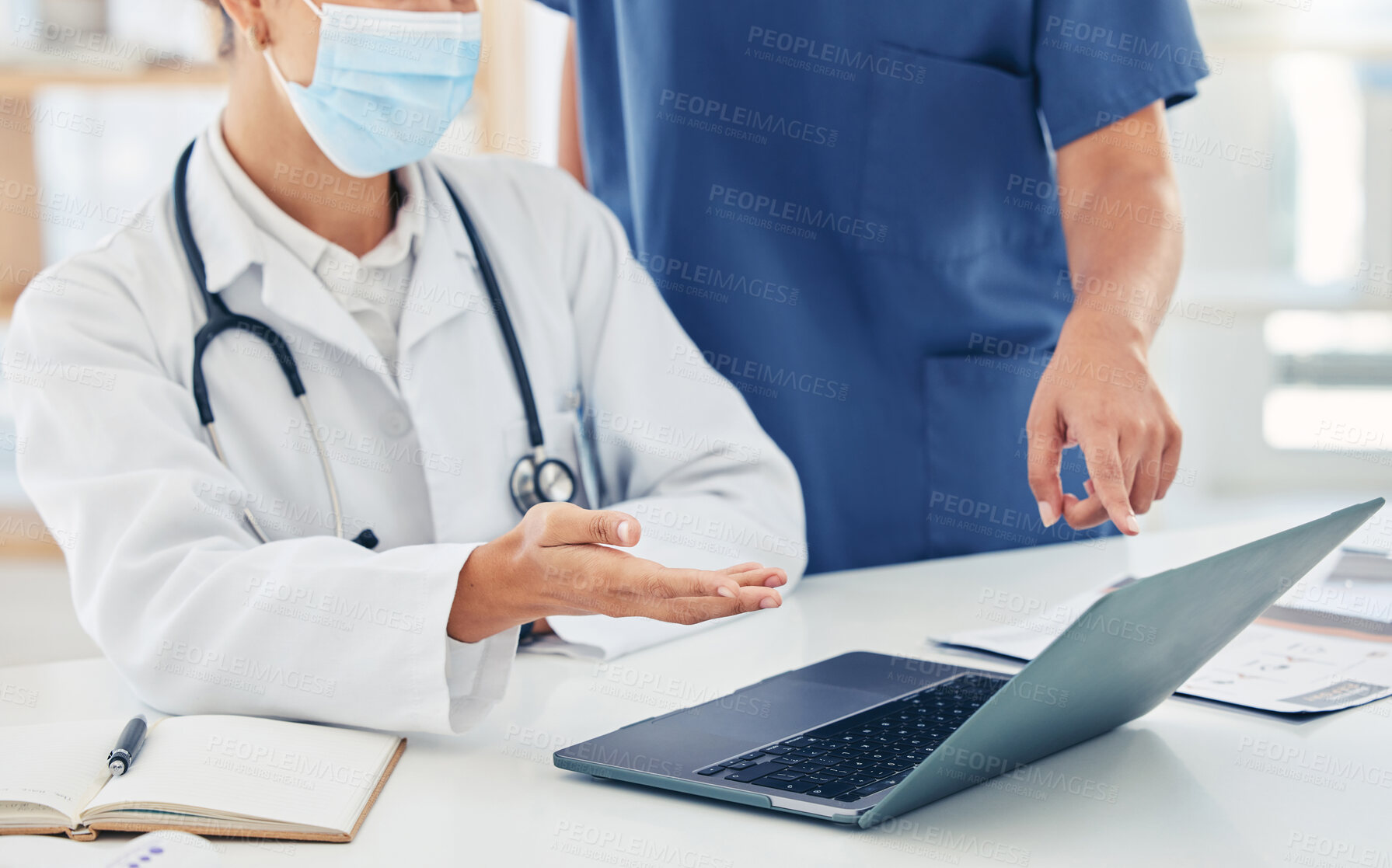 Buy stock photo Collaboration, laptop and hands with a doctor and nurse in discussion as a team about healthcare or medical diagnosis. Teamwork, insurance and research with online resource for innovation in medicine