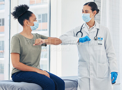 Buy stock photo Doctor, covid and greeting medical healthcare expert with patient in safe elbow with masks in a hospital. Happy women following safety social distance rules to prevent the spread of virus at clinic