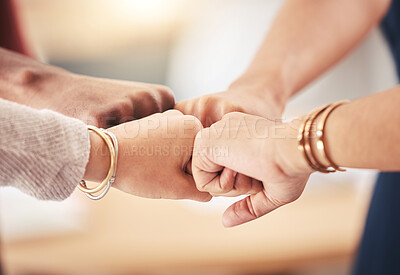 Buy stock photo Teamwork, hand and fist group of business people celebration, collaboration and support at work. Corporate professional team touching showing diversity, success and motivation in a startup office
