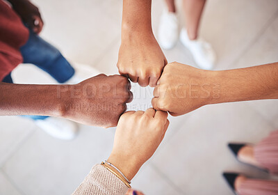 Buy stock photo Hands, teamwork and collaboration with a team of business people joining their fists in a circle in solidarity, unity and support from above. Motivation, goal and a mission or vision for success