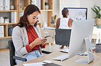 Office woman, desk and reading phone message and communication while working in corporate building. Young business executive and professional workplace girl looking at text on smartphone.