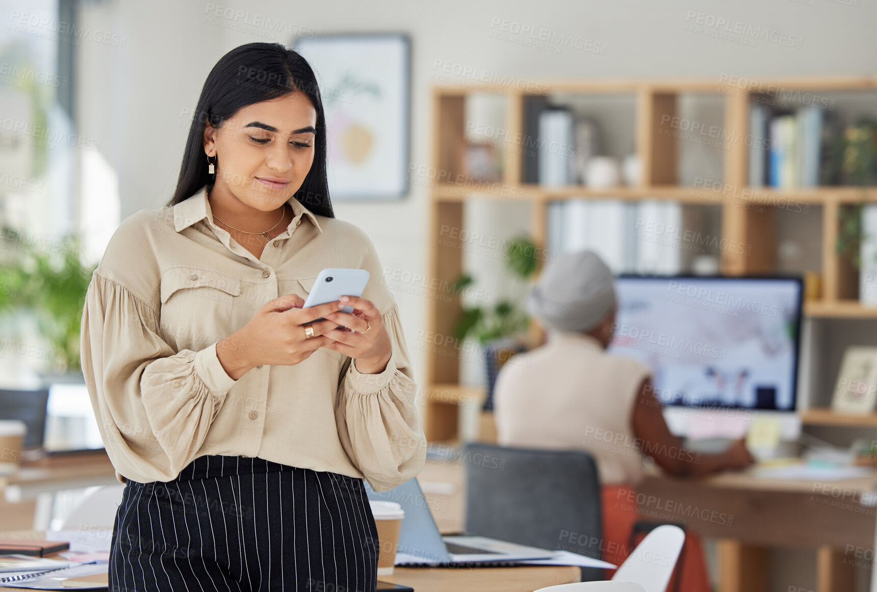 Buy stock photo Phone, communication and networking with a business woman reading a message in her office at work. Contact us with mobile technology or wifi and connect to the future with growth and development