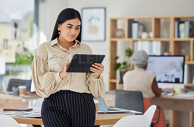 Buy stock photo Business woman, office and working on digital tablet in the workplace with colleague in the background. Happy employee busy with online marketing on touchscreen in research, development and design.