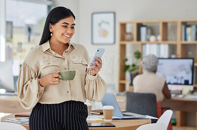 Buy stock photo Happy marketing manager texting on phone, advertising small business startup on social media and drinking a coffee. Young professional woman browsing online, typing email and respond to text message