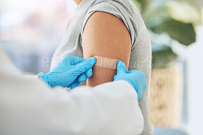 Buy stock photo Covid virus vaccination, vaccine and doctor hands with plaster on patient arm in a medical hospital or clinic. Healthcare worker help, trust and safety flu shot antigen for protection against disease