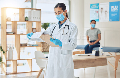 Buy stock photo Doctor with mask and patient for medical test results documents at hospital in covid or corona global pandemic. Consulting healthcare woman worker with health insurance paperwork of sick girl