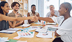 Creative business people handshake in a meeting for thank you, promotion or design innovation and success with team applause. Diversity group shaking hands for collaboration deal, teamwork or welcome