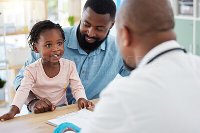 Buy stock photo Doctor consulting with black family, baby and father in doctors office in hospital. Medicine wellness, healthy child development and consultation in nurse, healthcare and medical clinic with smile