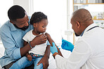 Healthcare, medical and doctor with kid patient and father holding baby for shot in hospital. Girl, children and family clinic nurse with vaccine for covid, virus or flu shot.