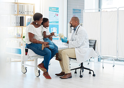 Buy stock photo Doctor, nurse or medical worker consulting with baby, mother and child patient for flu, allergies or covid in hospital room. Medicine, trust and support in a medical clinic with a health professional