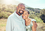 Happy, smile and love black couple relax in garden, park or nature together outdoors. Portrait african people, partner date and romance marriage in safe bonding, intimate hug and care relationship