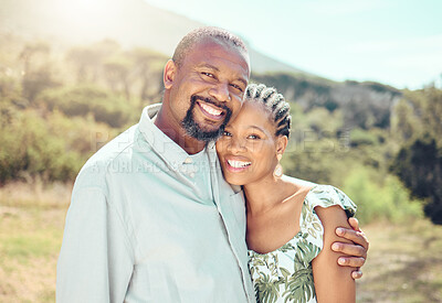 Buy stock photo Happy, smile and love black couple relax in garden, park or nature together outdoors. Portrait african people, partner date and romance marriage in safe bonding, intimate hug and care relationship