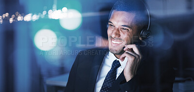 Buy stock photo Customer service, call center or telemarketing agent talking and helping client while working late in an office. Happy male helpdesk worker having a conversation with an international partner online