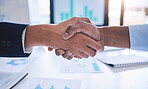 Hand of business people, partnership and hand shake for agreement on b2b corporate contract deal. Merger success, collaboration and handshake at teamwork strategy business meeting with chart and data