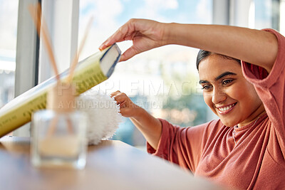 Buy stock photo Cleaning, home and woman dusting book shelf to remove dust and dirt. Spring cleaning, cleaning service and happy female cleaner, maid or housekeeper with duster for furniture, chores and hygiene.