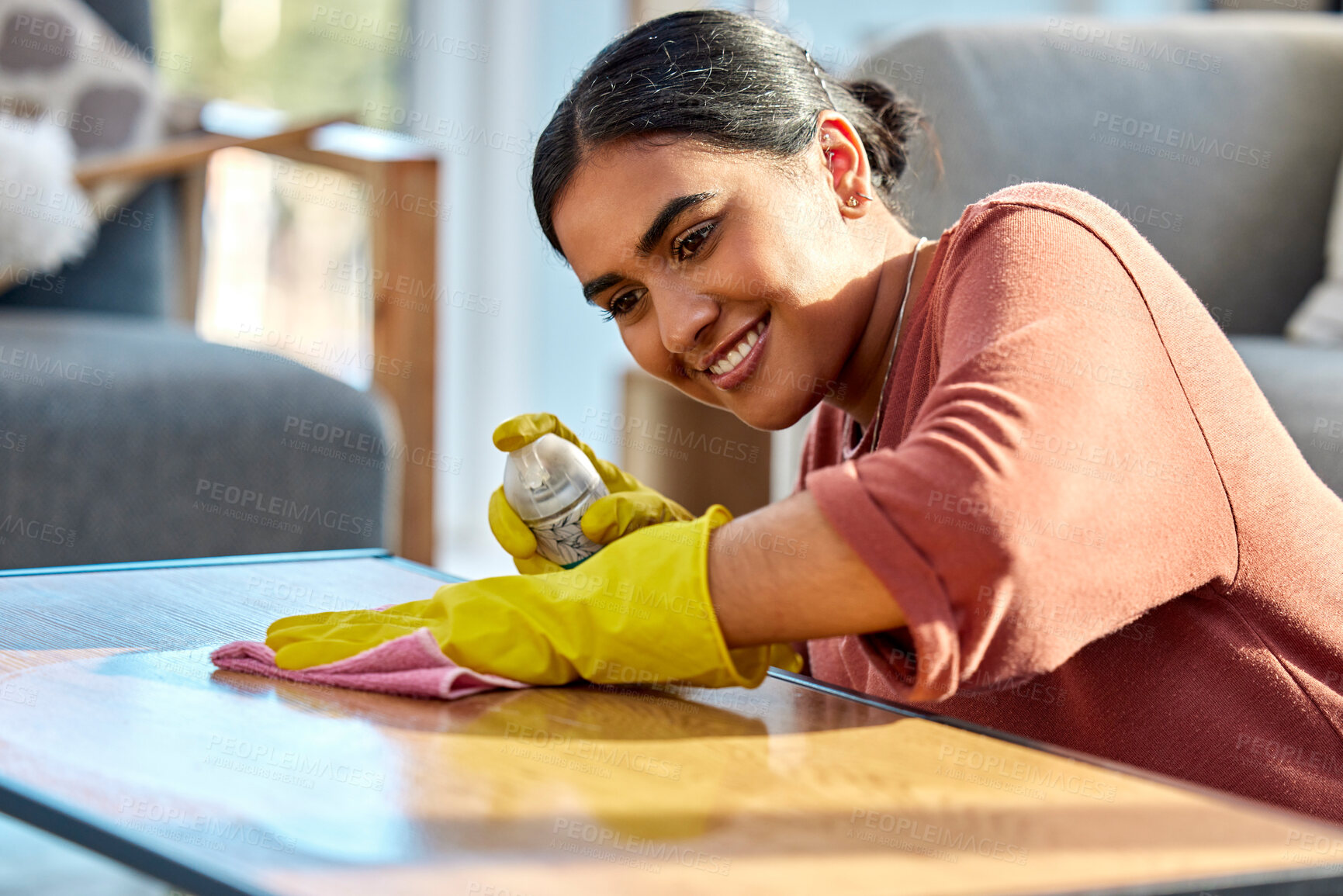 Buy stock photo Woman, wipe table and spray with cloth, for hygiene and disinfectant in home. Cleaner, maid or female cleaning service for bacteria, dust on furniture and housekeeping with rag, surface and detergent