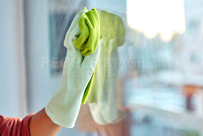 Buy stock photo Hand, latex and cloth for window cleaning, hygiene or clean housework and disinfection at home. Hands of cleaner wiping dirty glass for cleanliness, disinfect or anti bacteria and safe housekeeping