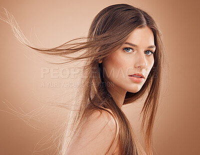 Buy stock photo Woman, face glow or windy hair on studio background in keratin treatment, dermatology health, care or collagen wellness. Portrait, brunette beauty model or facial makeup cosmetics for Canada skincare
