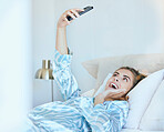 Selfie, girl in bed and photography with phone, technology and memory, smile and happy, young gen z with social media content creation. Happiness in picture, morning and smartphone, wifi 5g network.