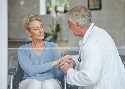 Buy stock photo Doctor, woman patient, and senior holding hands for healthcare consulting support for sad news. Hospital, wellness and health clinic with a elderly worker showing empathy after consultation test