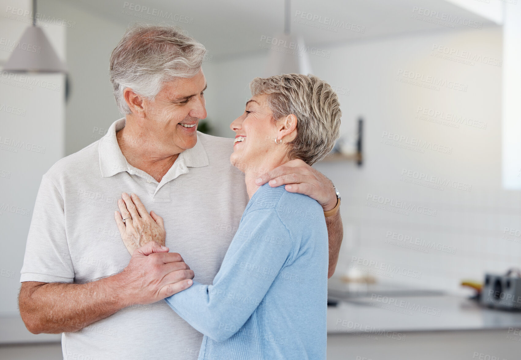 Buy stock photo Love, senior couple and hug with smile, happy and bonding for relationship, romance and quality time. Romantic, mature man and elderly woman embrace for loving, relax and together in home or marriage