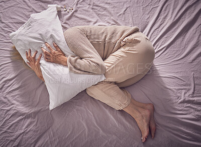 Buy stock photo Top view, depression and sad woman with pillow, bedroom and insomnia, anxiety problem and crying. Depressed, tired and sick lady in sleepless night, fear and mental health stress, scared and burnout 