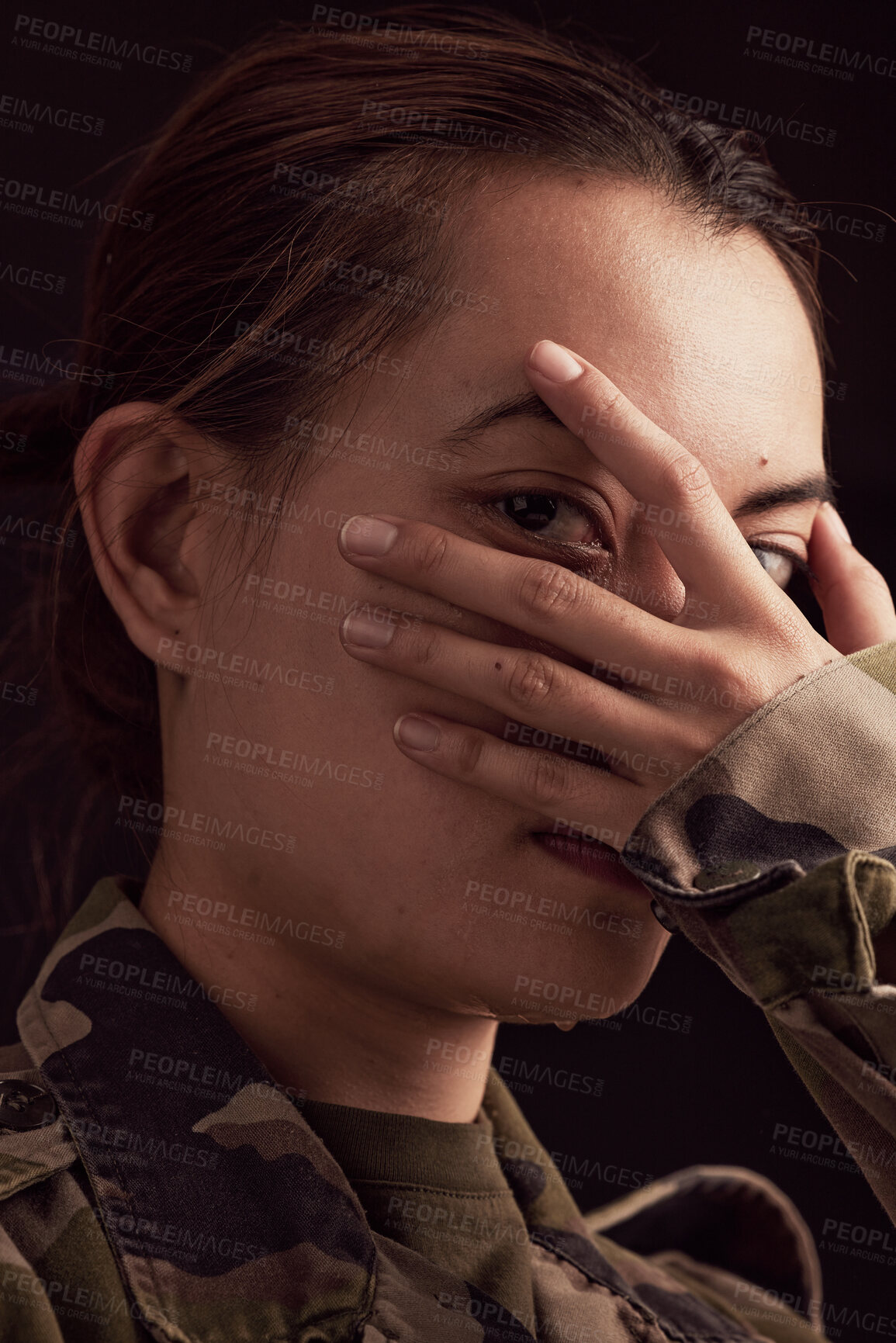 Buy stock photo Soldier woman, mental health and hand on face in studio for depressed, anxiety or stress in war clothes. Military ptsd, trauma memory and army portrait by black background with depression in Ukraine