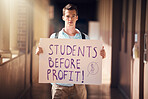 Protest, education and man with poster at university for freedom from student loans, debt and free learning. Justice, equality and student with sign for support at college, school and academic campus