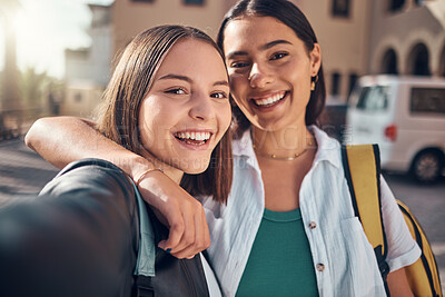 Buy stock photo Selfie, smile and students on campus with a hug, excited for school and memory during education. Happy, university and face portrait of girl friends with a photo at college together with happiness