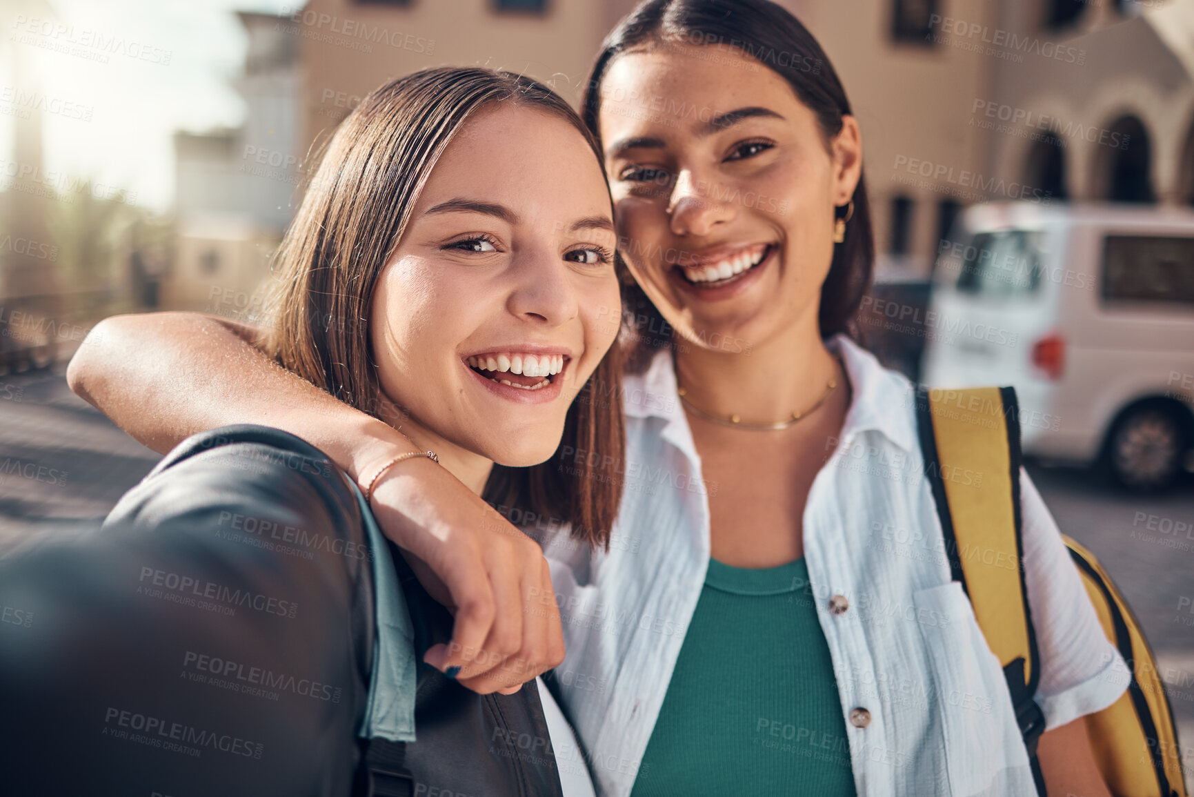 Buy stock photo Selfie, smile and students on campus with a hug, excited for school and memory during education. Happy, university and face portrait of girl friends with a photo at college together with happiness