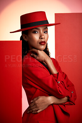 Buy stock photo Fashion, studio and stylish woman in a suit with a seductive, sensual and elegant outfit. Edgy, fashionable and portrait of female African model with trendy style posing by orange and red background.