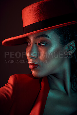 Buy stock photo Fashion, dark and stylish woman in a studio with a seductive, vintage and elegant outfit. Sensual, fashionable and mysterious African female in a red suit posing while isolated by a black background.