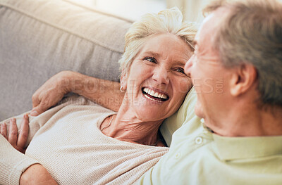 Buy stock photo Love, smile and relax with old couple on sofa for affectionate, bonding and happiness. Retirement, trust and marriage with man and woman in living room of home for support, quality time and peace