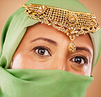 Muslim, woman face and fashion portrait with hijab for islamic beauty, religion jewelry and culture traditional wear. Islam, senior woman and Indian head scarf or burka for arabic headshot in studio