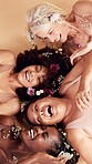 Top view, diversity and women with flowers, cosmetics and skincare on a brown studio background. Multiracial, females and ladies with body positivity, natural beauty or makeup for confidence or smile
