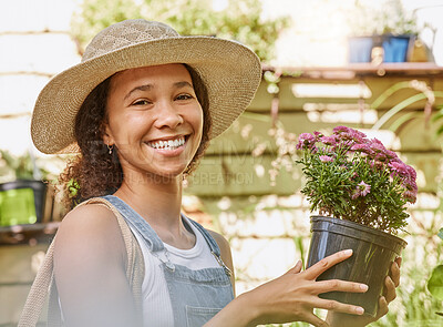 Buy stock photo Face, flower pot and black woman shopping in floral shop or nursery. Portrait, sustainability and happy female gardener from South Africa with beautiful flowers after buying at plant store or market.