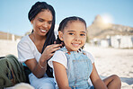 Happy girl portrait, hair care and mother on a beach on summer holiday with mom love and care. Hairstyle help, support and happiness of a mama with her child relax on vacation by the sea and ocean