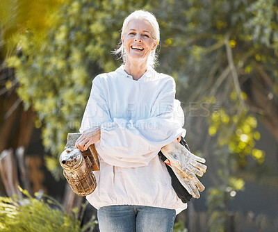 Buy stock photo Beekeeper woman, portrait and smile with protective suit, happy and work outdoor in agriculture. Senior bee farmer, happy and beekeeping ppe at farm, backyard or bee bellows for honey production