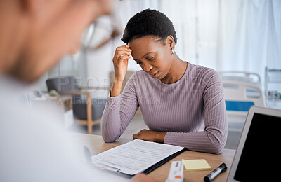 Buy stock photo Healthcare consultation, insurance and paperwork for medical aid or black woman stress for cardiology bills in hospital. Doctor, sad african patient and health consulting documents for test results
